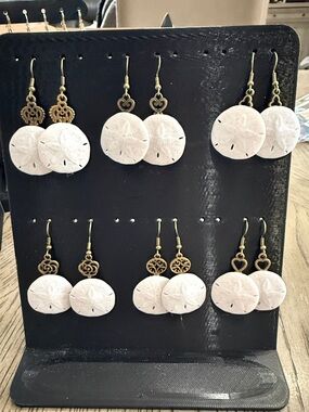 6- pairs of small sand dollar with red copper key earring backings